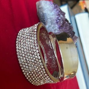 Lot of 2 party fashioned silver bangles. One full of rhinestones on the half top